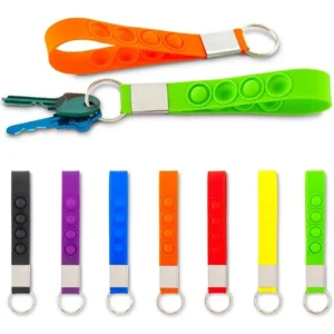 Llavero pulsera popper anti estress en silicone 16x1.6cms.